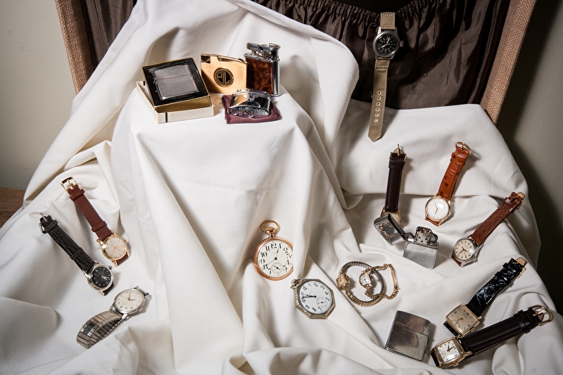 A collection of vintage lighters & watches, Elgin, Ronson, Bulova and more.